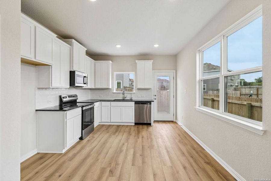 Furnished interior view inside a new home in Casinas at Gruene, New Braunfels (Image 6).