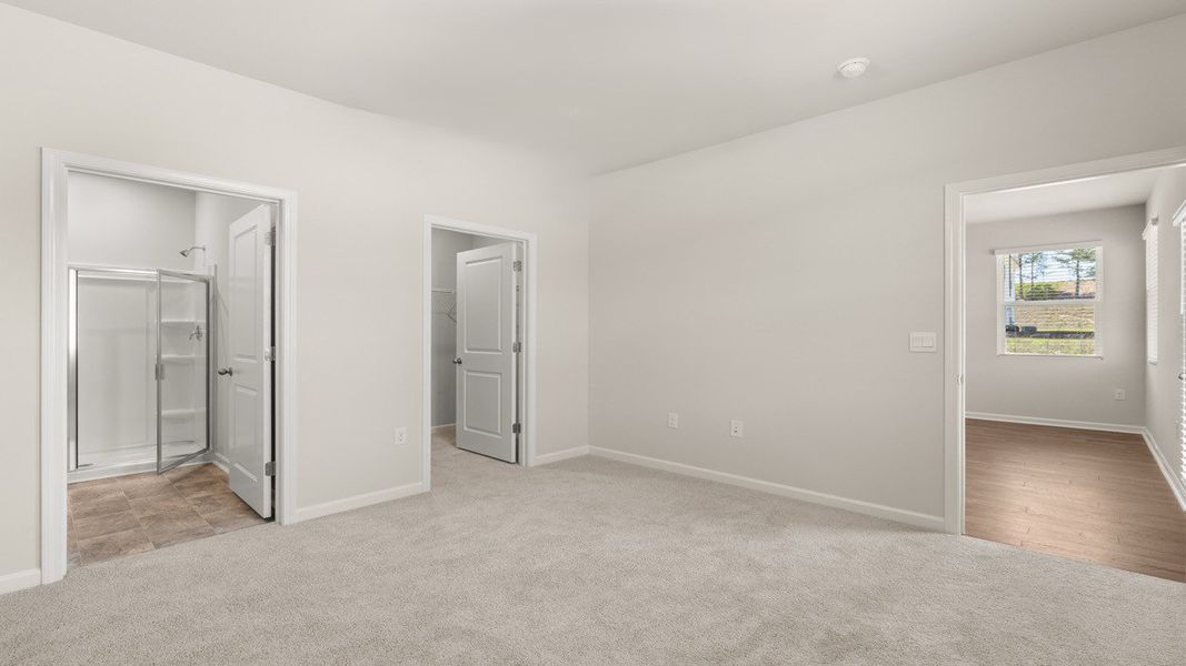Spacious, unfurnished interior of a new home in Byrd Village, Graniteville (Image 13).