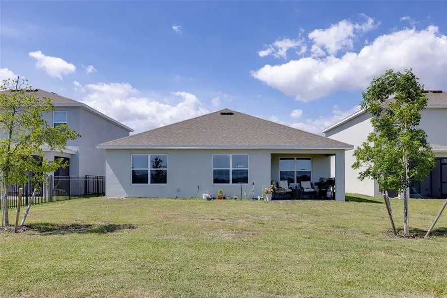 Exterior details and patio area of a home in Coral Bay - Express & Tradition, North Fort Myers (Image 3).