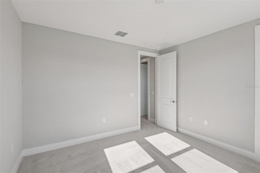 Spacious, unfurnished interior of a new home in Lagoon Residences at Epperson, Wesley Chapel (Image 40).