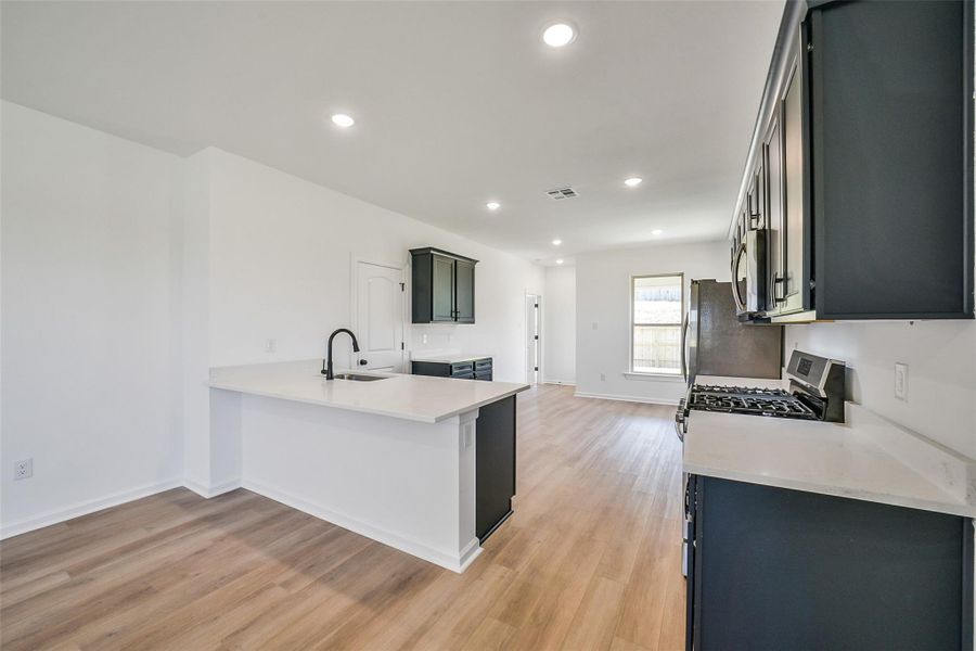 Furnished interior view inside a new home in Mostyn Springs, Magnolia (Image 10).