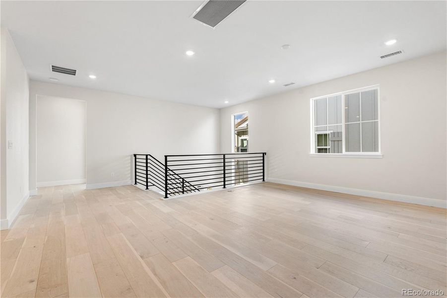 Spacious, unfurnished interior of a new home in Gallery at The Canyons, Castle Pines (Image 38).