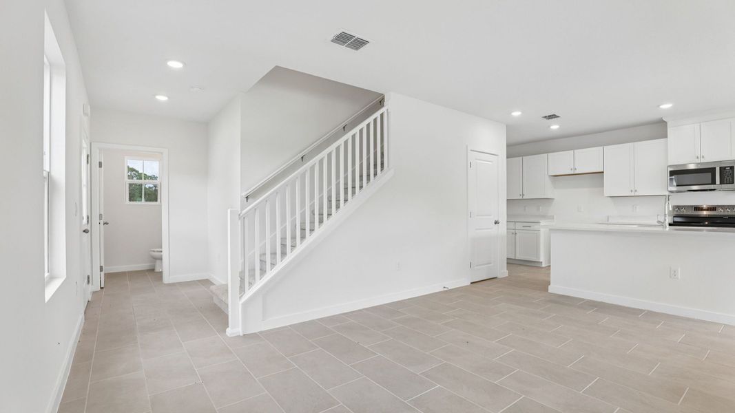Furnished interior view inside a new home in Cyrene at Harmony, St. Cloud (Image 6).