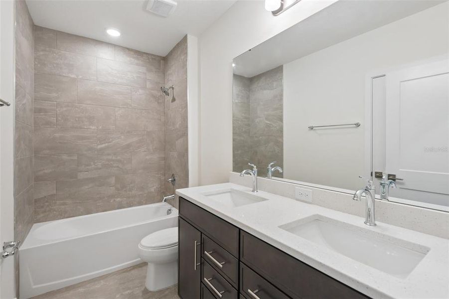 Furnished interior view inside a new home in Grasslands West, Lakeland (Image 11).