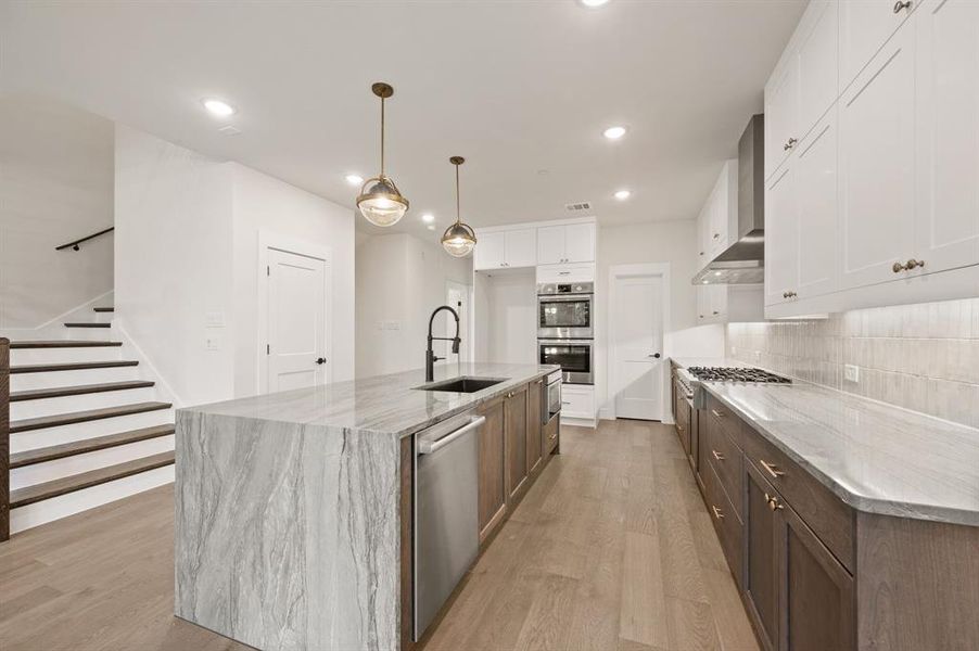 The chef will never be left out of the party in this over-the-top, open concept dream home! The chef will never be left out of the party in this over-the-top, open concept dream home!