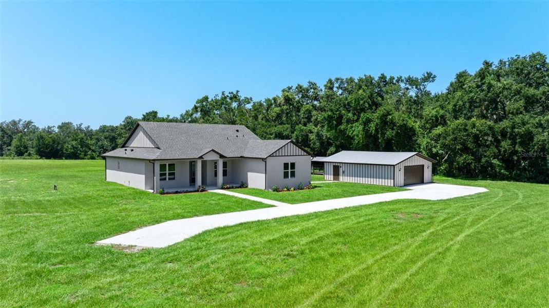 Front exterior of a new home in , San Antonio, FL, highlighting curb appeal (Image 2).