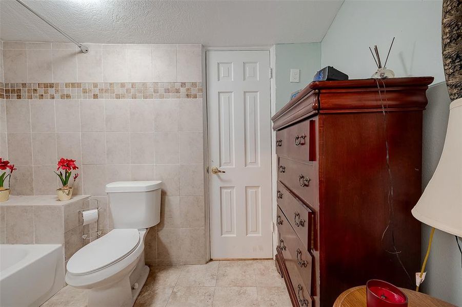 The bathroom is spacious enough to accommodate drawers, providing ample storage for organizing toiletries and essentials.