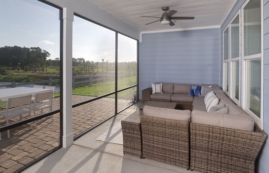 Screened porch with plenty of space for outdoor furniture.