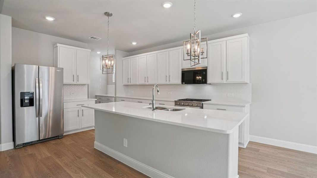 Photo is not of the actual home, but is an inspirational photo of builder’s model home and may depict options, furnishings, and/or decorator features that are not included.