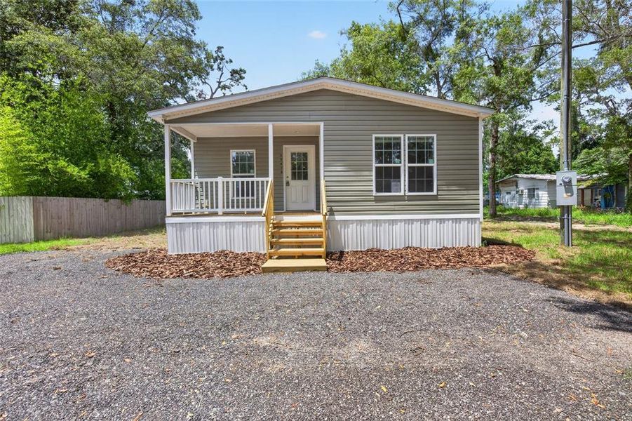 Exterior details and patio area of a home in , Brooksville (Image 22).