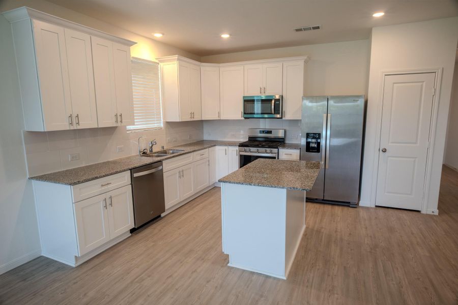 Furnished interior view inside a new home in Mustang Ridge, Alvin (Image 10).