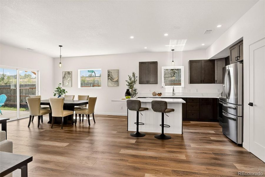 Bright and open dining with access to deck space.