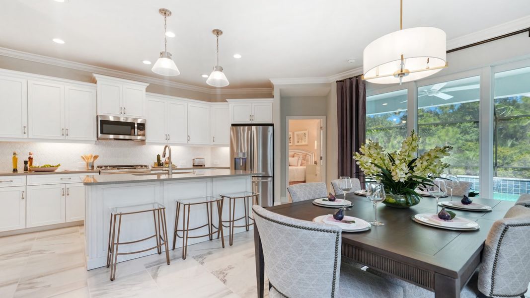 Representative furnished interior of a home built from the Patriot by Neal Communities in Boca Royale Golf & Country Club at Wellen Park, Englewood (Image 9).