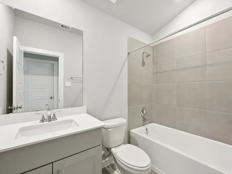 Furnished interior view inside a new home in Pine Lake Cove - Premier Series, Montgomery (Image 7).