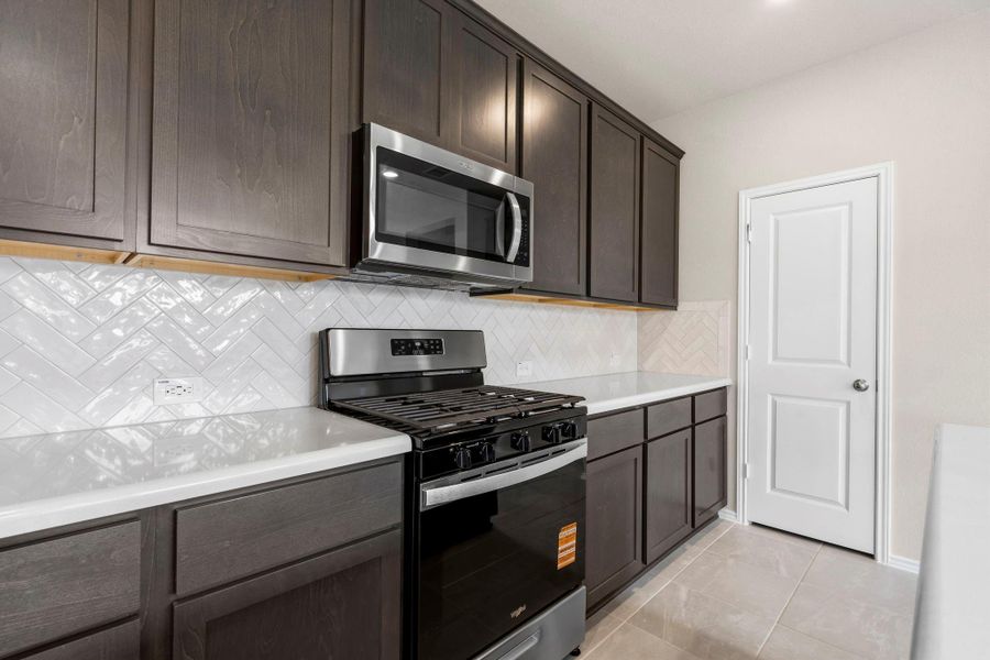 Furnished interior view inside a new home in Bridgeland, Cypress (Image 8).