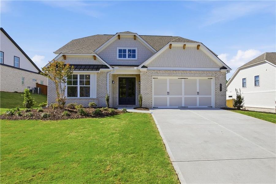 Front exterior of a new home in Yellowstone Farms, Cumming, GA, highlighting curb appeal (Image 22).