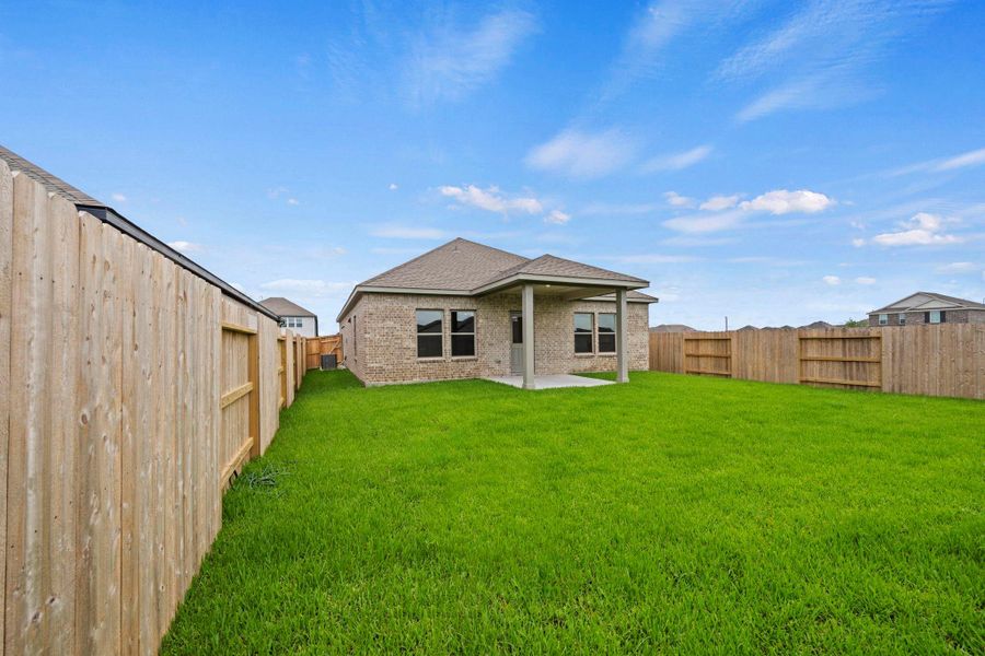 Exterior details and patio area of a home in Windrose Green, Angleton (Image 3). Exterior details and patio area of a home in Windrose Green, Angleton (Image 3).