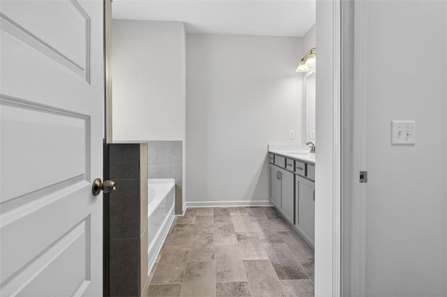 Furnished interior view inside a new home in Jameson Towns, Villa Rica (Image 9).