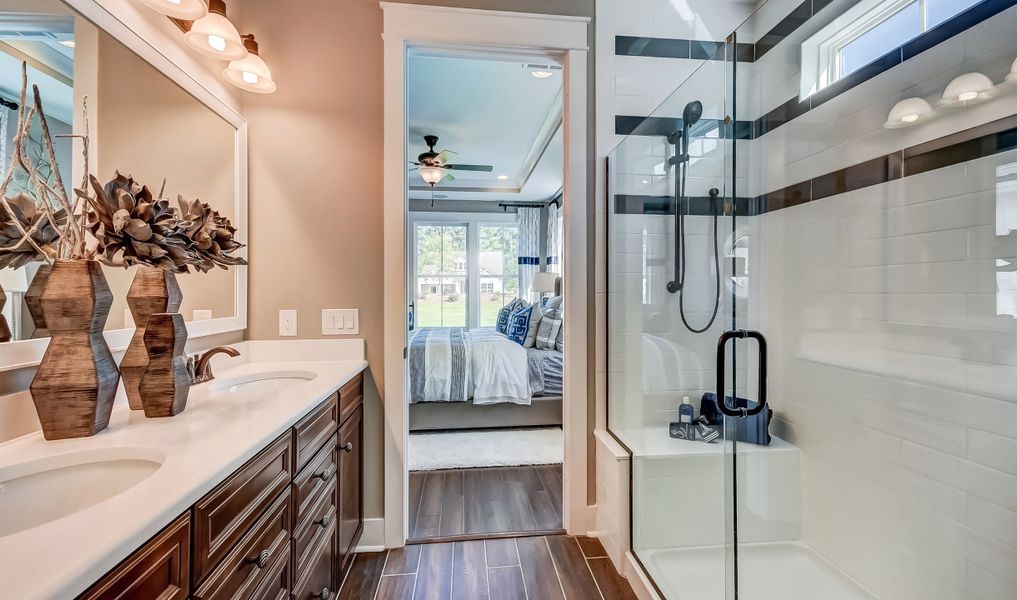 Frameless shower enclosure in owner's bath