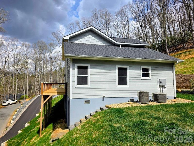 Rear of the house with access and end of deck