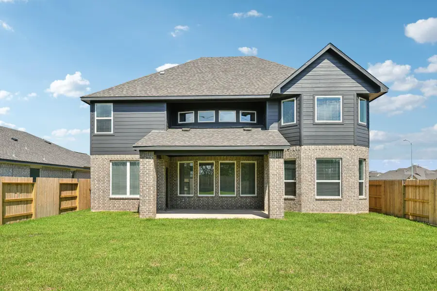 Exterior details and patio area of a home in Kingdom Heights, Rosenberg (Image 2). Exterior details and patio area of a home in Kingdom Heights, Rosenberg (Image 2).