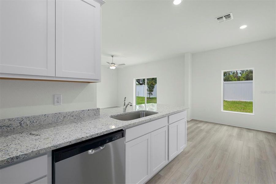 Furnished interior view inside a new home in Tula Parc, Astatula (Image 8).