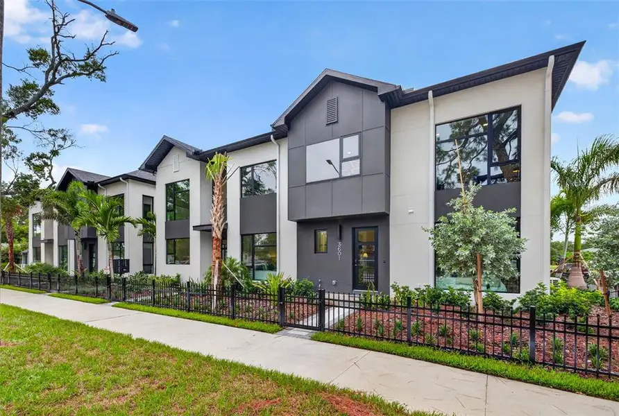 Front exterior of a new home in , St. Petersburg, FL, highlighting curb appeal (Image 1). Front exterior of a new home in , St. Petersburg, FL, highlighting curb appeal (Image 1).