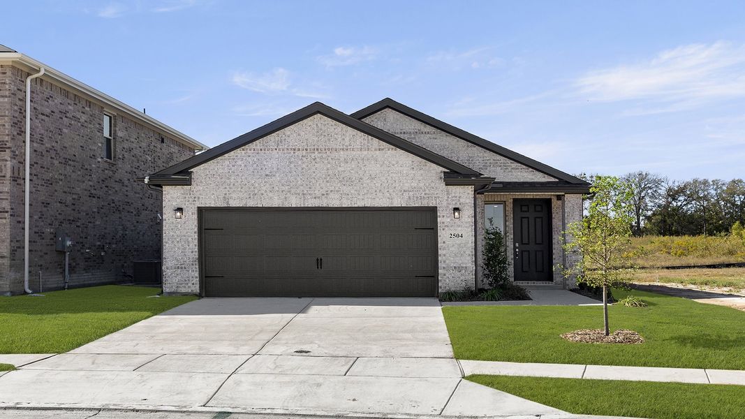 Front exterior of a new home in Churchill, Anna, TX, highlighting curb appeal (Image 2). Front exterior of a new home in Churchill, Anna, TX, highlighting curb appeal (Image 2).
