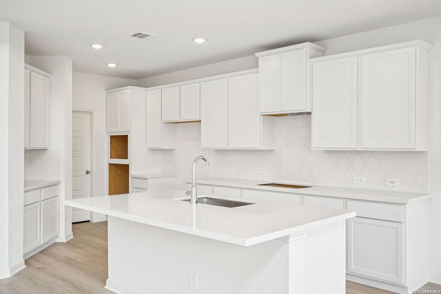 Furnished interior view inside a new home in Estancia Ranch - Classic Series, San Antonio (Image 14).
