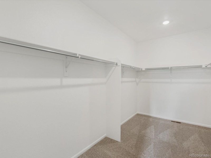 Spacious, unfurnished interior of a new home in Buffalo Highlands: The Flora Collection, Commerce City (Image 16).