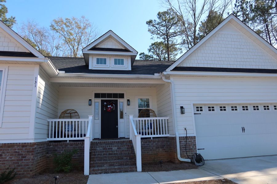 Front exterior of a new home in , Santee, SC, highlighting curb appeal (Image 22).