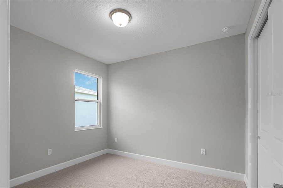 Spacious, unfurnished interior of a new home in Cresswind at Lake Harris, Tavares (Image 15).