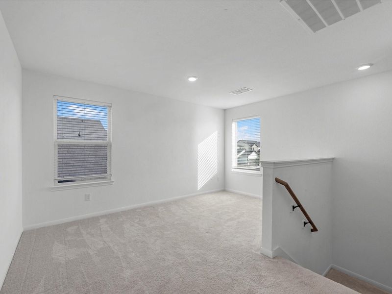 The stairs lead to a large game/media room The stairs lead to a large game/media room