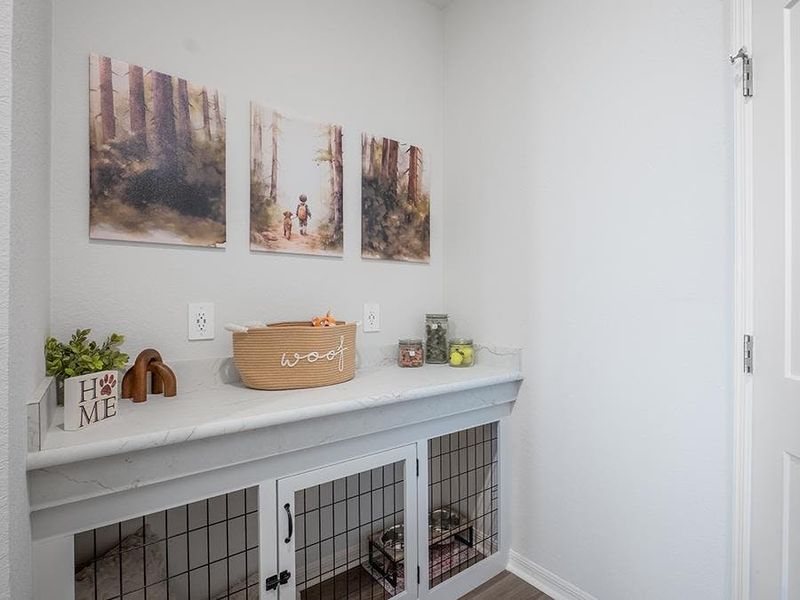 A mudroom with a drop zone counter and coat closet is located at the garage entry - Monroe by Highland Homes A mudroom with a drop zone counter and coat closet is located at the garage entry - Monroe by Highland Homes