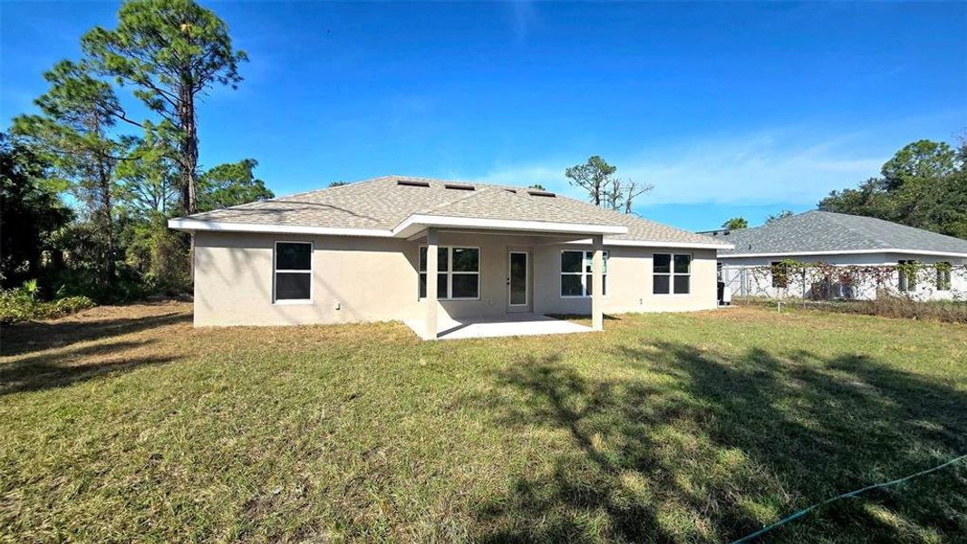 Exterior details and patio area of a home in North Port, North Port (Image 1).