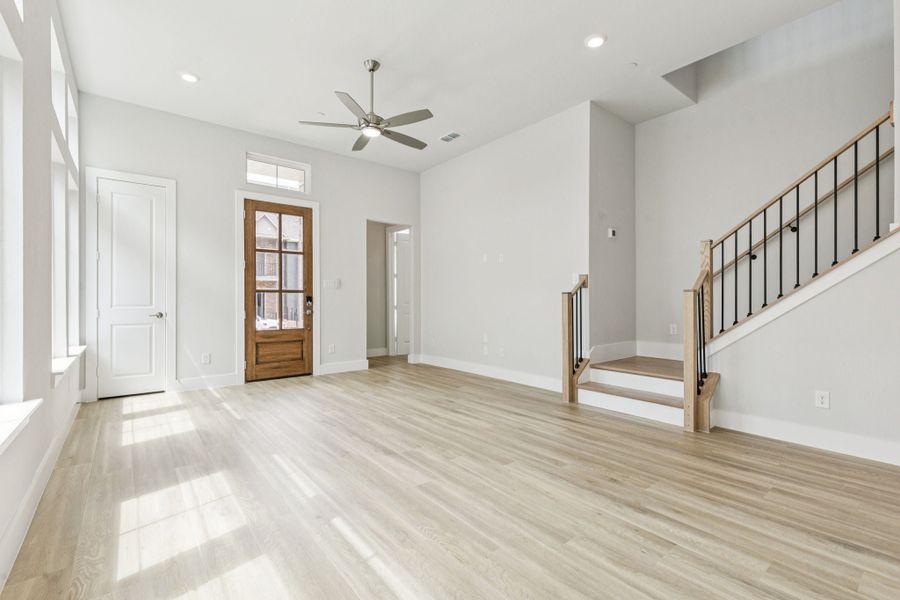 Representative unfurnished interior of a home built from the Hamilton by Centre Living Homes in Newman Village Townhomes, Frisco (Image 21).