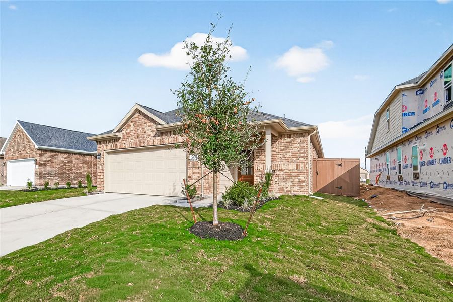 Front exterior of a new home in , Iowa Colony, TX, highlighting curb appeal (Image 19).