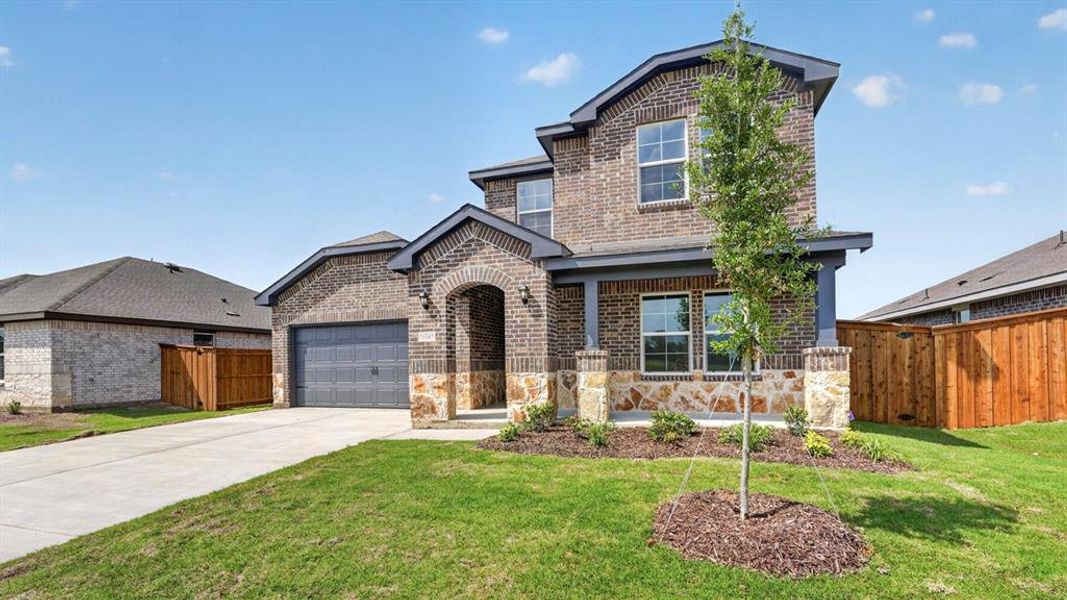 Front exterior of a new home in Forestbrook Estates, Paris, TX, highlighting curb appeal (Image 18).