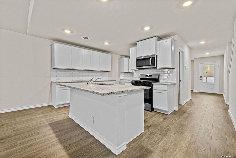 Furnished interior view inside a new home in Redbird Ranch, San Antonio (Image 8).