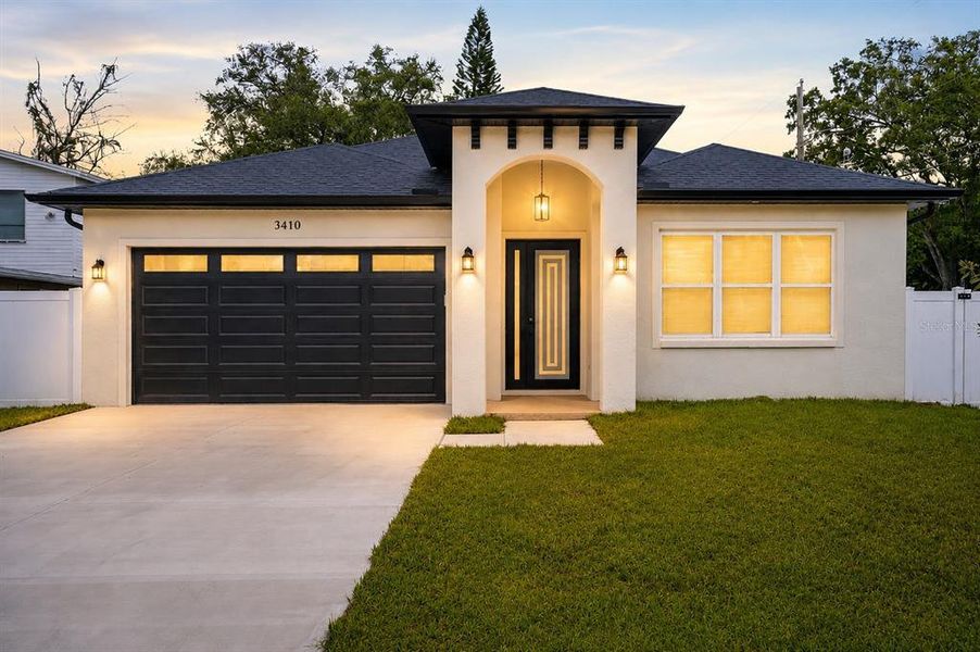 Front exterior of a new home in , Tampa, FL, highlighting curb appeal (Image 1). Front exterior of a new home in , Tampa, FL, highlighting curb appeal (Image 1).