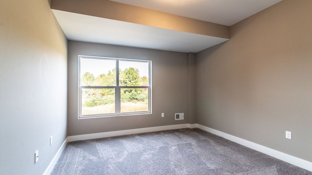 Representative unfurnished interior of a home built from the The Boulder Side Entry by Norfolk Homes in The Grande Estates, Jackson (Image 33).