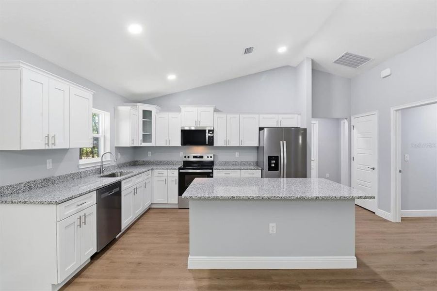 Furnished interior view inside a new home in , Dunnellon (Image 7).