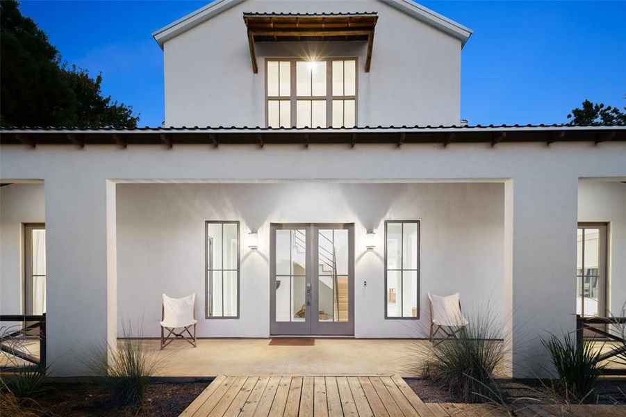Rear view of house with french doors Rear view of house with french doors