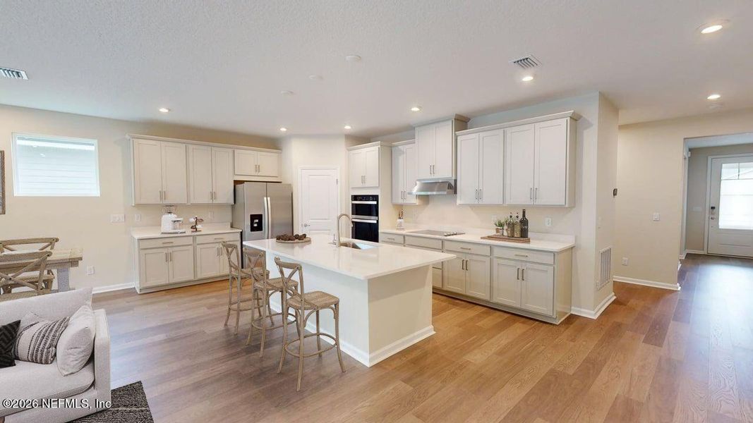 Furnished interior view inside a new home in Lakes at Bella Lago, Green Cove Springs (Image 4).