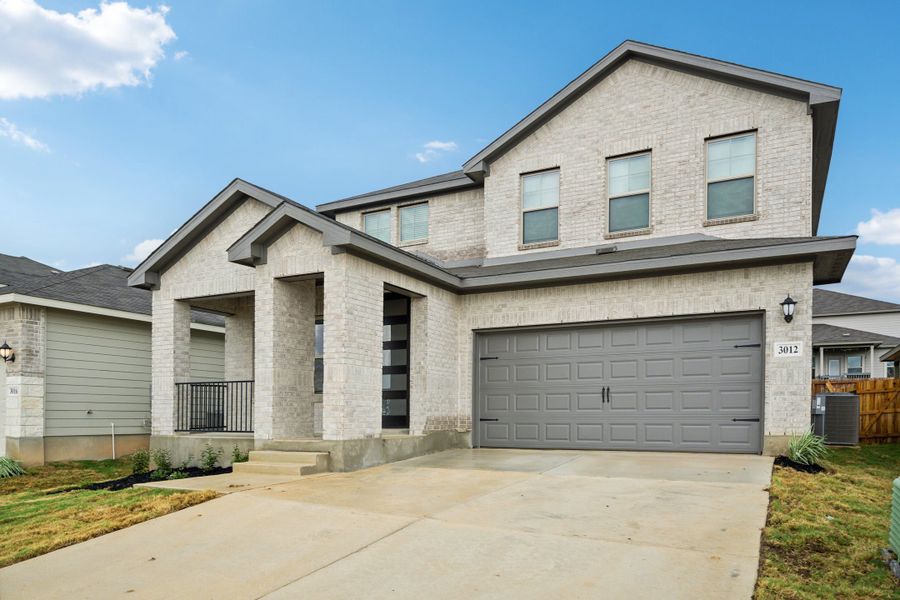 Front exterior of the Reynolds floorplan at a Meritage Homes community.