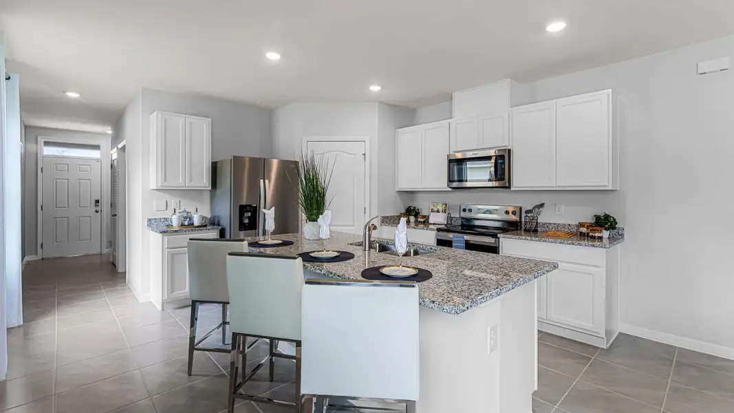 Representative furnished interior of a home built from the Harper by D.R. Horton in Deerbrook, Land O' Lakes (Image 5).