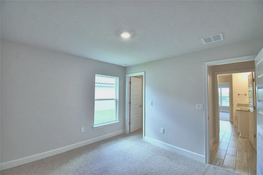 Spacious, unfurnished interior of a new home in Lake Juliana Estates, Auburndale (Image 24).