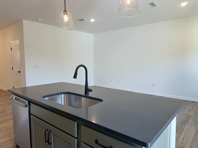 Kitchen featuring the AW Collection® Rosemary - Matte black, light wood, and garden-inspired style.