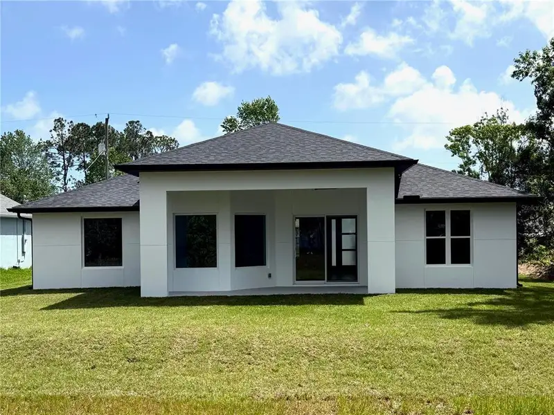 Exterior details and patio area of a home in , Palm Coast (Image 4).