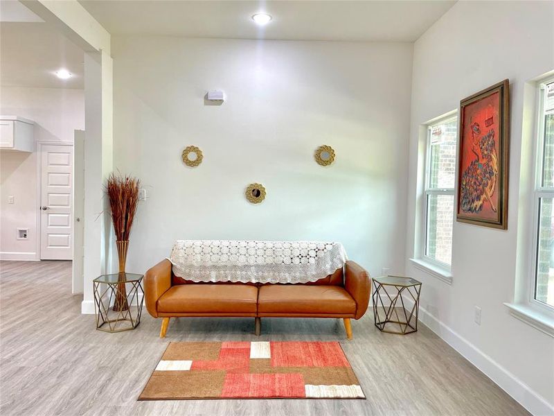 Living room featuring baseboards and wood finished floors